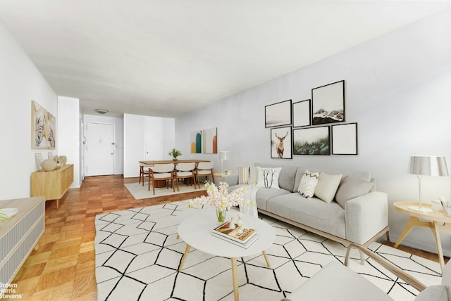 living room featuring light parquet floors