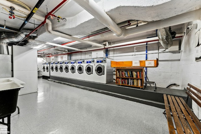 unfinished below grade area with separate washer and dryer