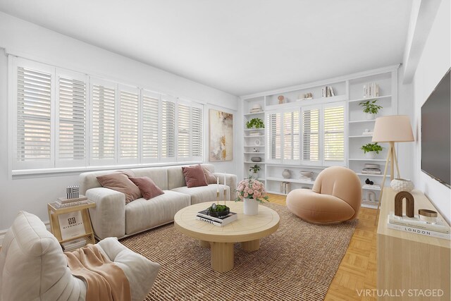 7 Park Ave Unit 23, New York City, NY 10016 - living room featuring plenty of natural light and built in features