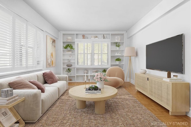 living room with parquet flooring and built in features