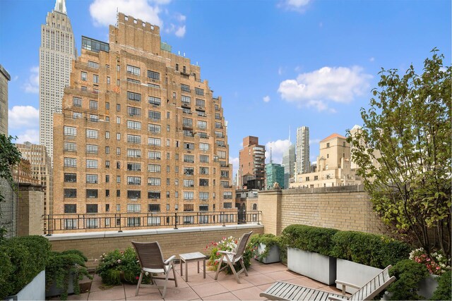 7 Park Ave Unit 23, New York City, NY 10016 - view of patio featuring a skyline view