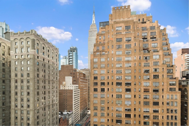 view of building exterior featuring a view of city