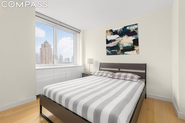 bedroom featuring light hardwood / wood-style floors