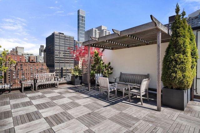 view of patio featuring an outdoor hangout area and a pergola