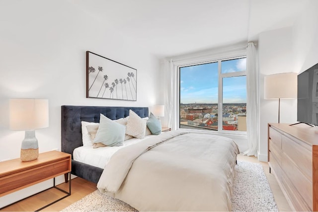 bedroom featuring light hardwood / wood-style floors