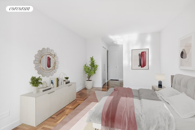 bedroom featuring visible vents and baseboards