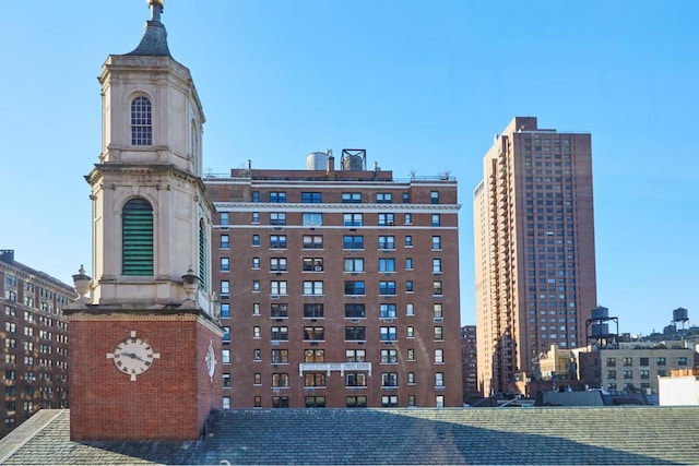 view of property with a view of city