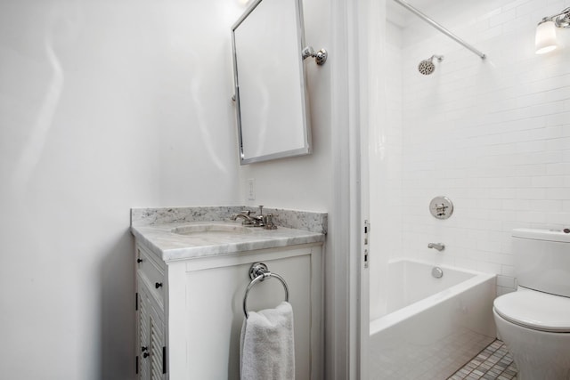 bathroom with shower / washtub combination, vanity, and toilet