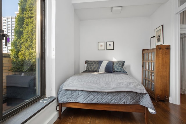 bedroom featuring wood finished floors