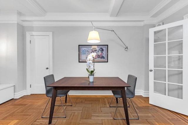 dining space with beam ceiling, parquet floors, and ornamental molding