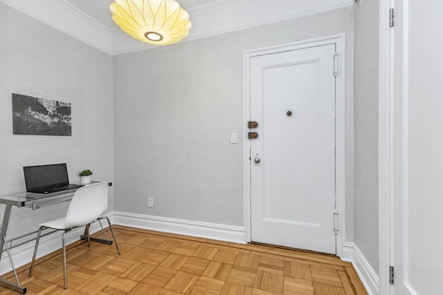 home office with ornamental molding and light parquet flooring