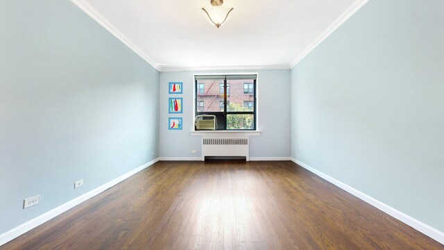 kitchen with radiator, rail lighting, stainless steel fridge with ice dispenser, beverage cooler, and light wood-type flooring