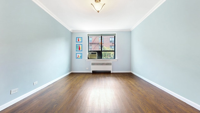 unfurnished room featuring radiator, crown molding, baseboards, and dark wood-style flooring