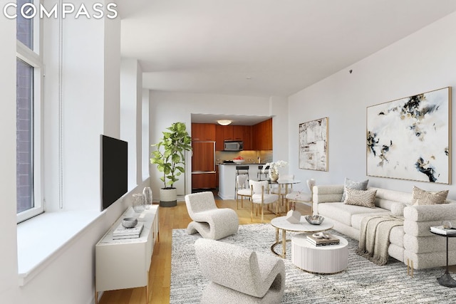 living room with light hardwood / wood-style floors