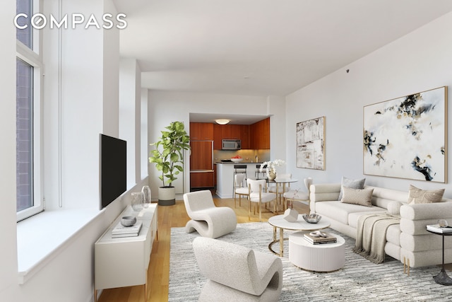 living area with light wood-style floors