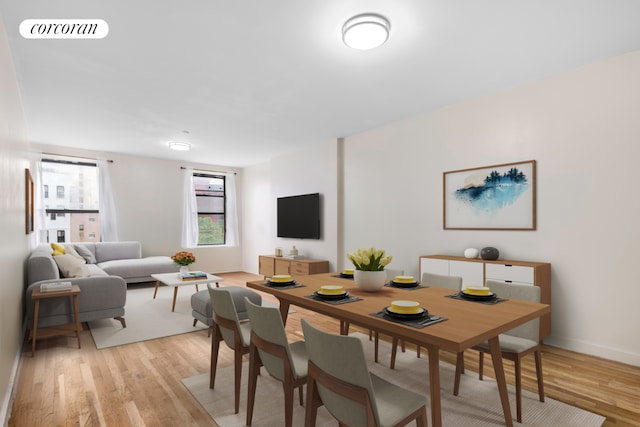 dining area with light wood-type flooring