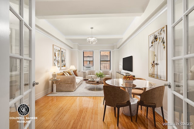 dining area featuring beamed ceiling, wood finished floors, french doors, an inviting chandelier, and baseboards