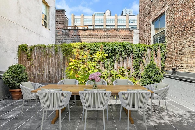 view of patio / terrace with fence and outdoor dining space