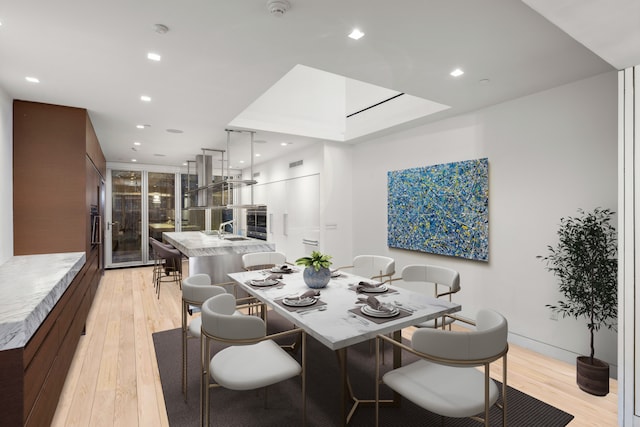 46 Laight St Unit Ph4, New York City, NY 10013 - dining room with light wood finished floors and recessed lighting