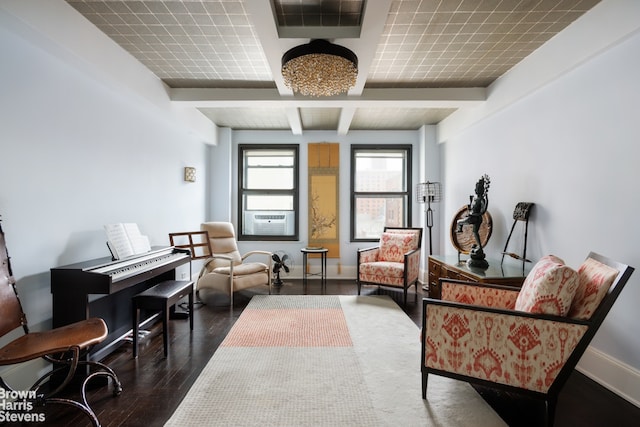 living area with beamed ceiling, cooling unit, and dark hardwood / wood-style floors