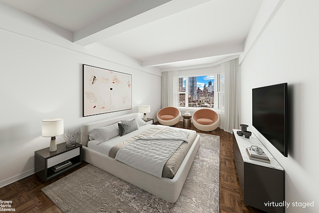 bedroom with beamed ceiling and baseboards