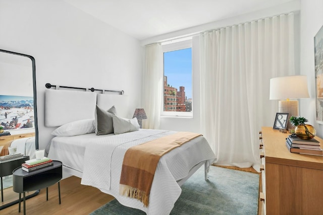 bedroom featuring light hardwood / wood-style floors