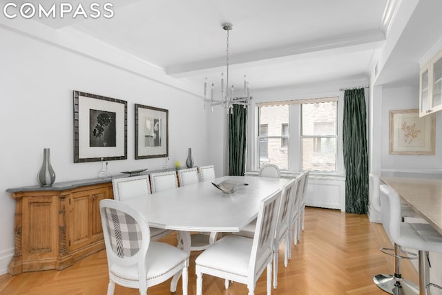 dining room featuring light parquet flooring, ornamental molding, beam ceiling, and a notable chandelier