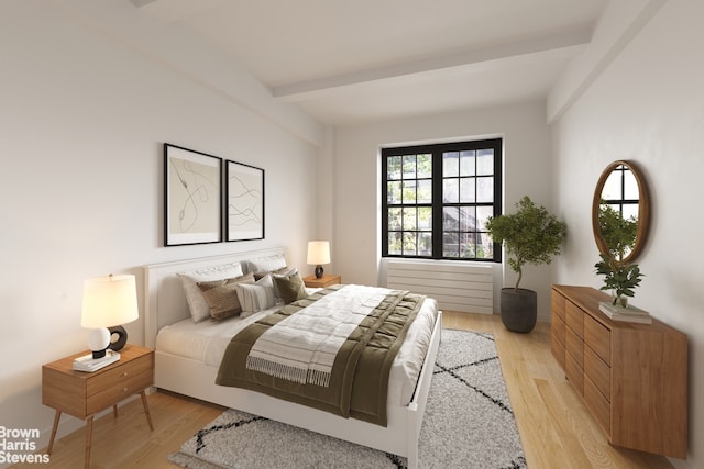 35 W 9th St Unit 1B, New York City, NY 10011 - bedroom featuring beam ceiling and light wood-type flooring