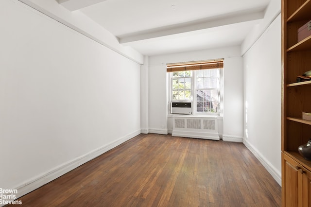 35 W 9th St Unit 1B, New York City, NY 10011 - empty room featuring dark wood finished floors, baseboards, radiator, and beamed ceiling