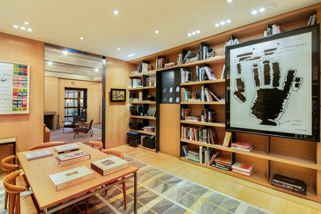 unfurnished living room featuring dark hardwood / wood-style floors