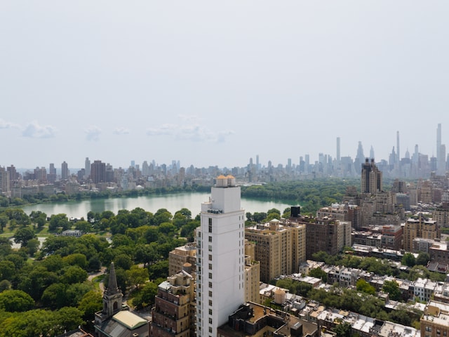 property's view of city featuring a water view