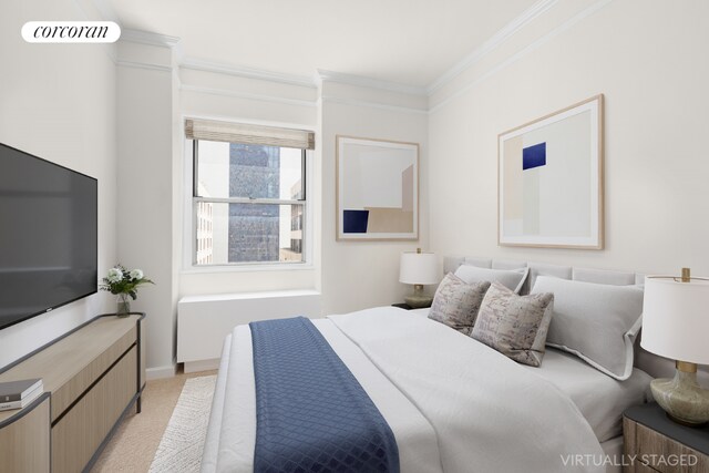 carpeted bedroom with crown molding