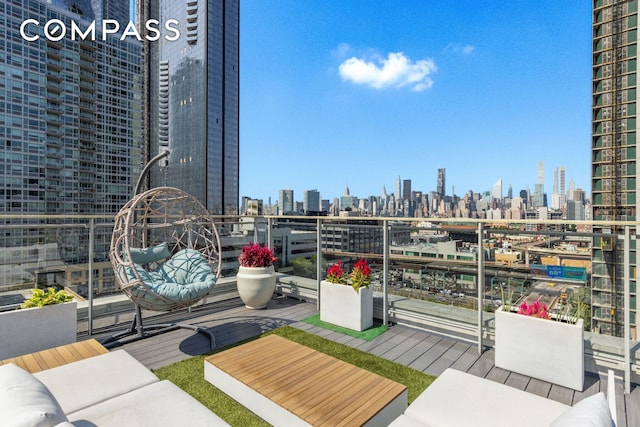 balcony featuring a view of city