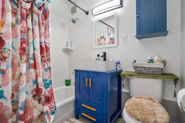 full bath with visible vents, vanity, and shower / bathtub combination with curtain