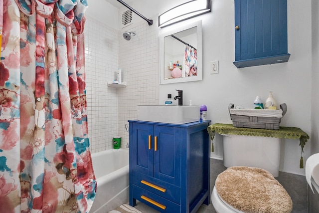 full bathroom featuring shower / bathtub combination with curtain, sink, and toilet