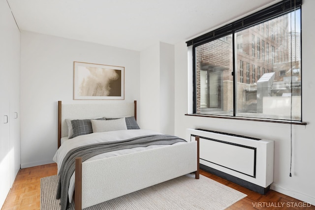 bedroom with baseboards