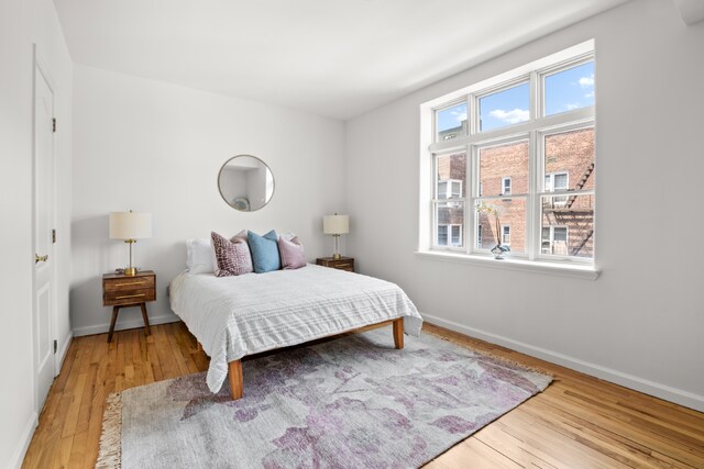 bedroom featuring light wood-type flooring