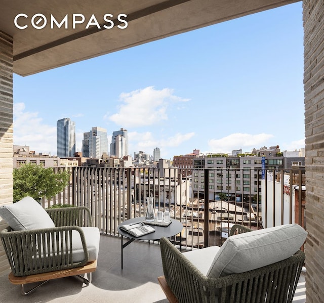 balcony featuring a view of city