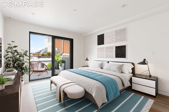 bedroom featuring access to outside and wood-type flooring