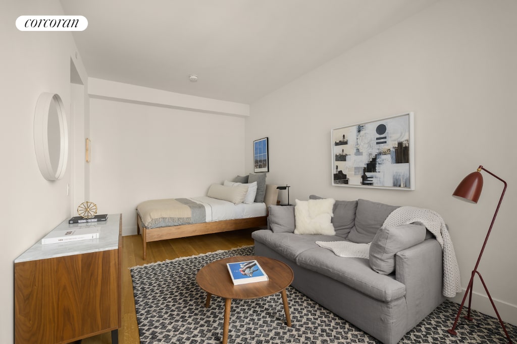 bedroom featuring wood-type flooring