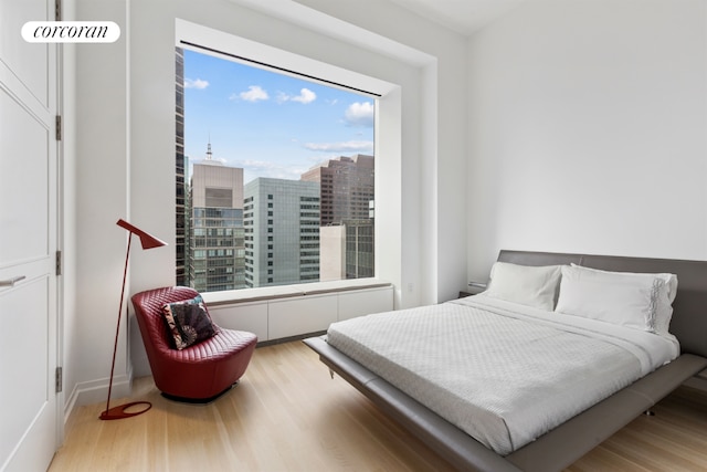 bedroom featuring light wood-type flooring