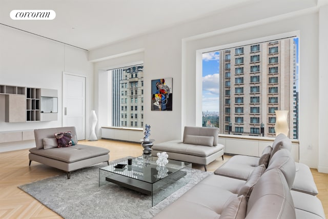 living room featuring parquet floors