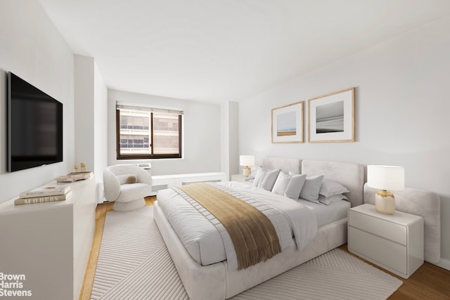 bedroom featuring light wood-type flooring