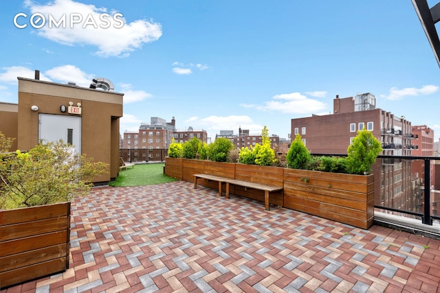 view of patio featuring a view of city