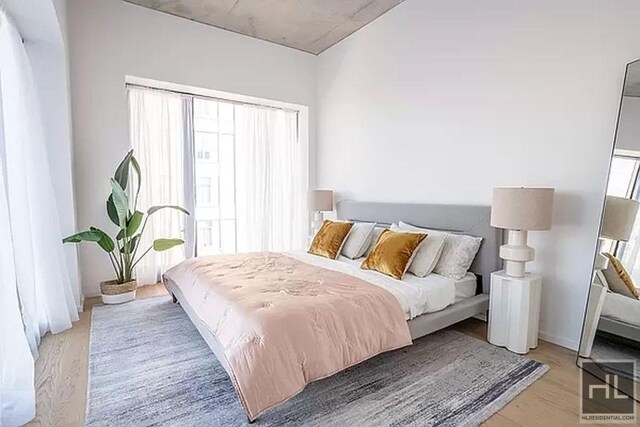 bedroom with light wood-style flooring