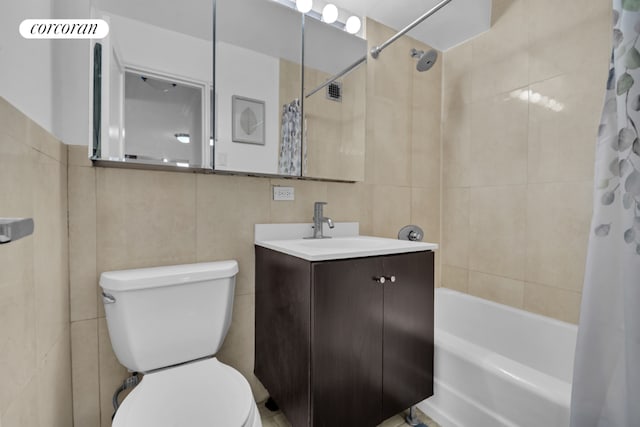 full bathroom with toilet, shower / bathtub combination with curtain, tile walls, and vanity