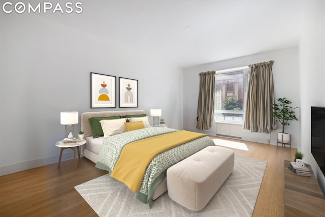 bedroom featuring dark hardwood / wood-style floors