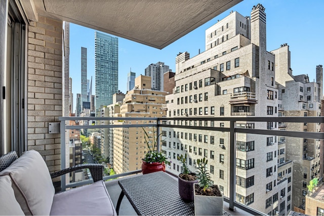 balcony featuring a city view