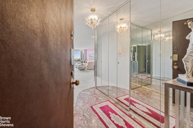 bedroom with carpet and a textured ceiling