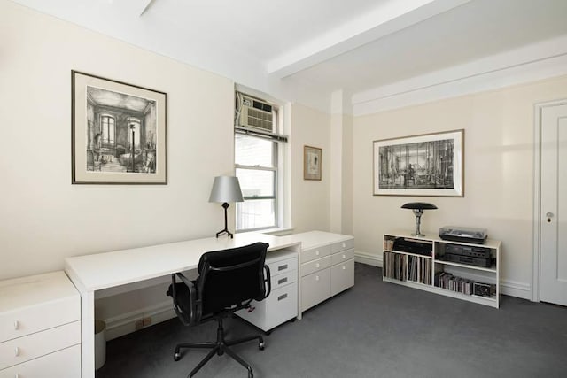 carpeted office space with beamed ceiling and a wall unit AC